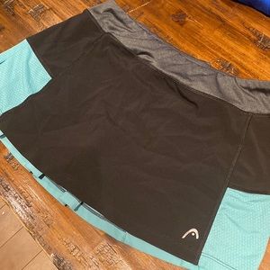 Turquoise and black tennis skirt size M